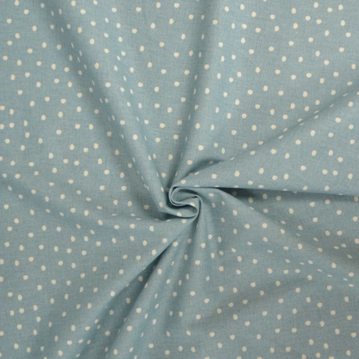 Spotty ocean blue sustainable cotton fabric for curtains