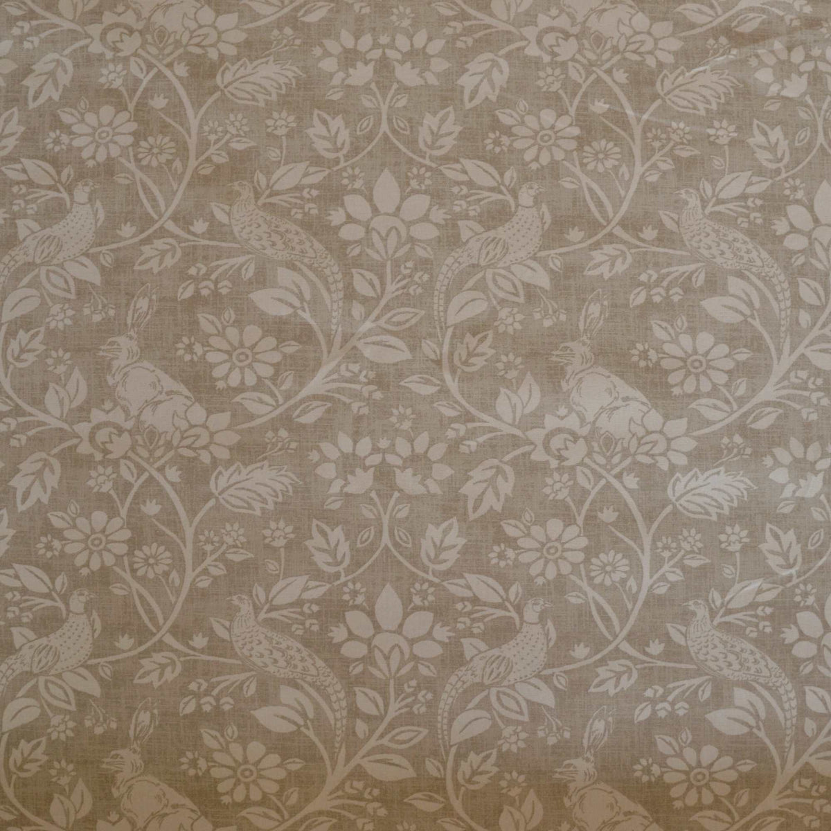 Hares and Pheasants design printed curtain fabric with a natural background and cream design