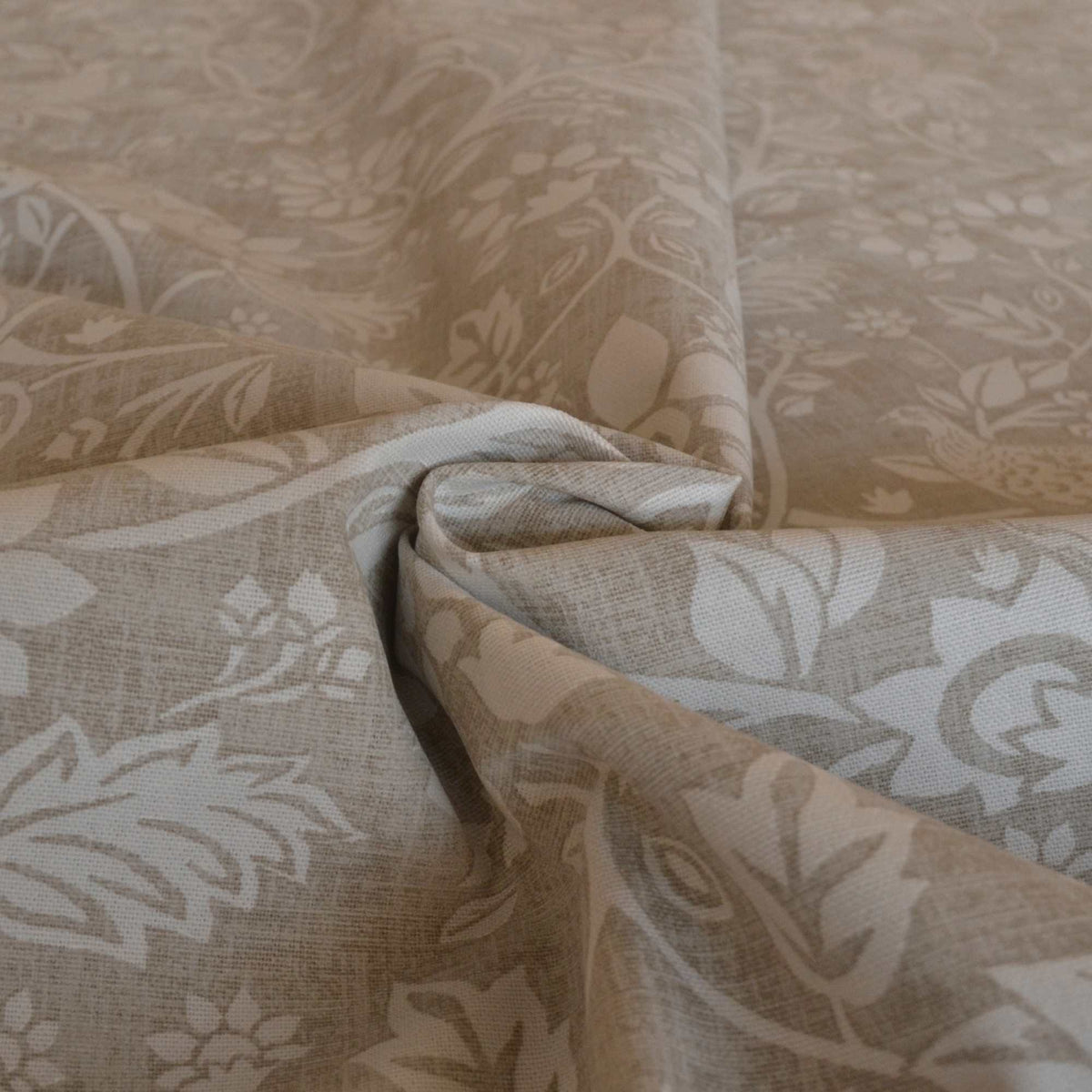 Natural linen colour curtain fabric with a cream hares and pheasants design