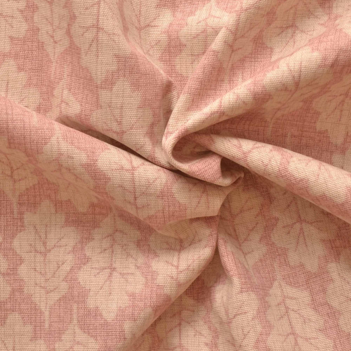 Pink curtain fabric with a leaf print
