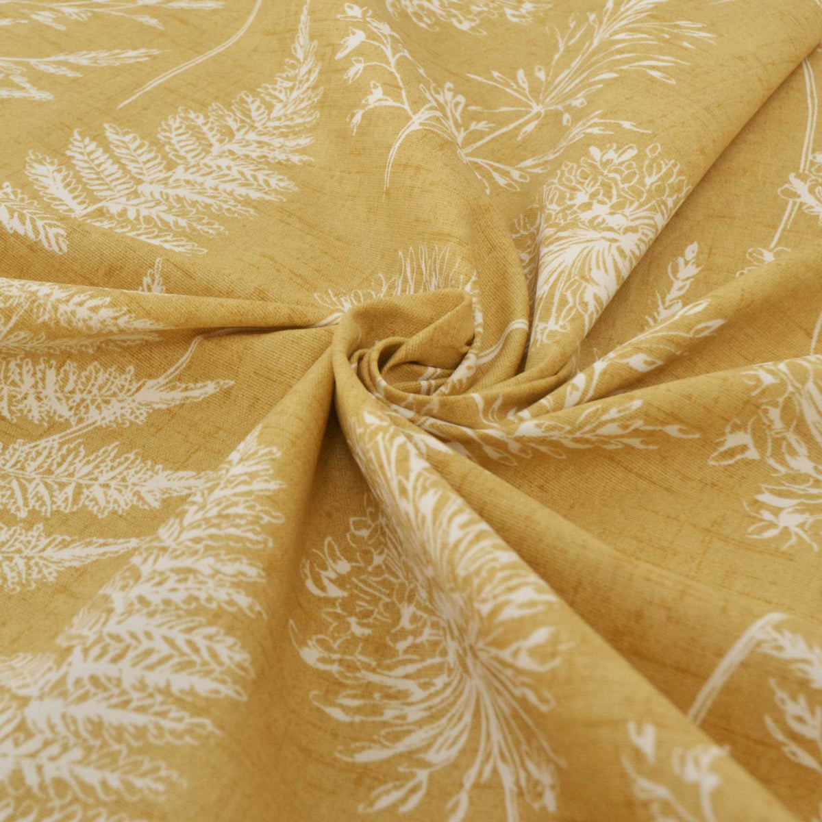 Mustard yellow sustainable curtain fabric with a floral pattern