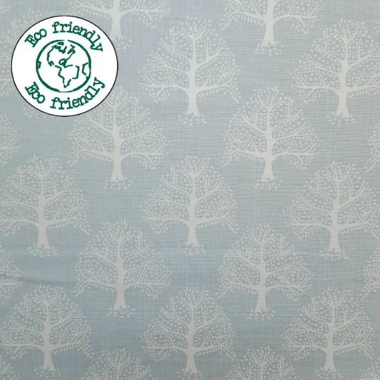 Light Blue Fabric with a print of oak trees and and eco friendly badge